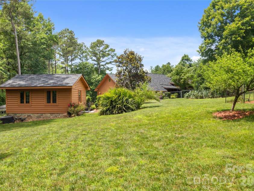 214 Harbor Ridge Drive, Connelly Springs, NC 28612.  MLS# CAR4386674, YatesRealty ID 37663. Beautiful side yard.
