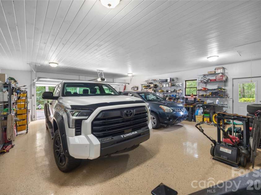 214 Harbor Ridge Drive, Connelly Springs, NC 28612.  MLS# CAR4386674, YatesRealty ID 37663. Oversized garage with new epoxy floors.