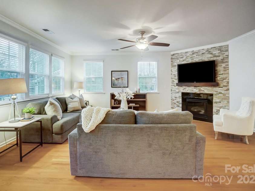 1126 Snowbird Lane, Waxhaw, NC 28173.  MLS# CAR4222147, YatesRealty ID 3767. Custom fireplace with gas logs.