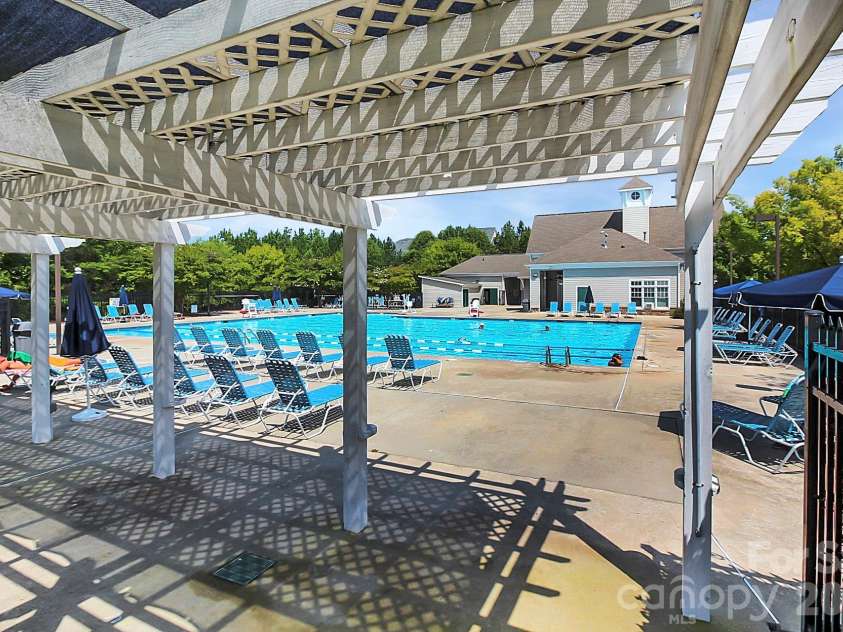 718 Deerbrook Lane, Tega Cay, SC 29708.  MLS# CAR4326224, YatesRealty ID 3767. Tega Cay pool features a Jr. Olympic and kiddie pool from May-Sept.