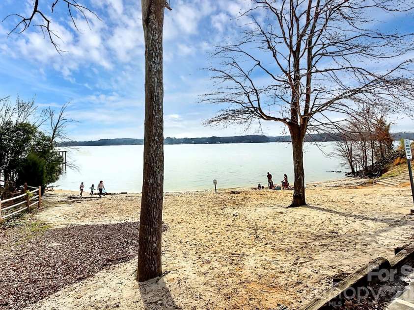 718 Deerbrook Lane, Tega Cay, SC 29708.  MLS# CAR4326224, YatesRealty ID 3767. View of the second beach at Windjammer Park.