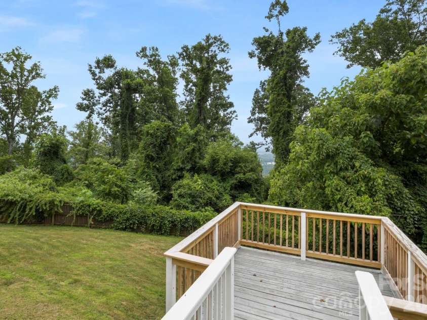 26 Crestwood Drive, Arden, NC 28704.  MLS# CAR4400337, YatesRealty ID 37672. Back yard