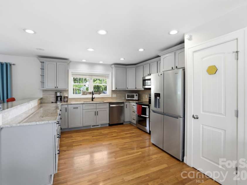 26 Crestwood Drive, Arden, NC 28704.  MLS# CAR4400337, YatesRealty ID 37672. Plenty of Counterspace and Pantry