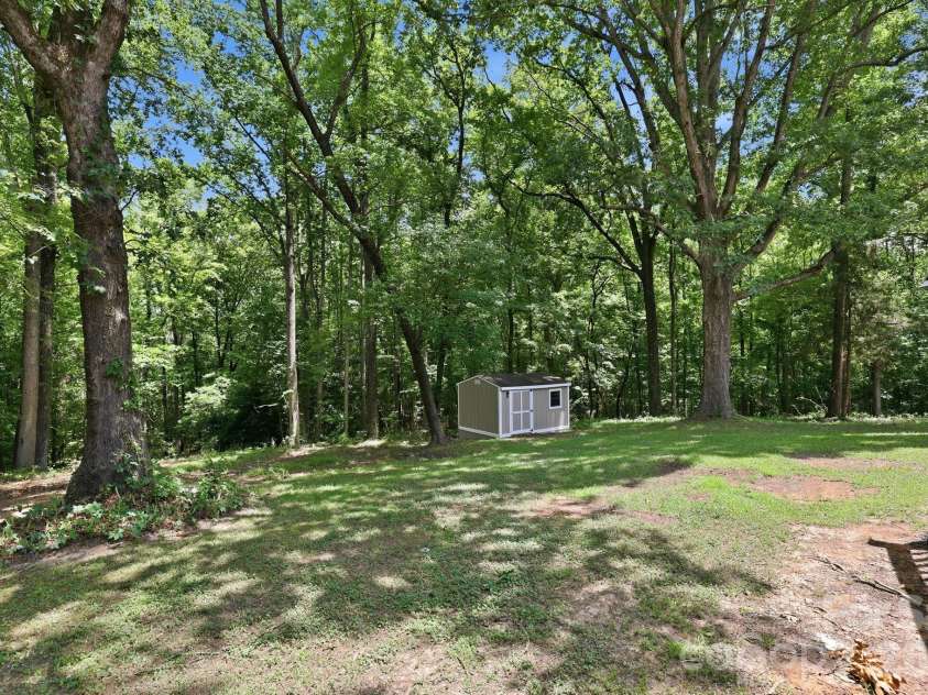 1801 Bridgewood Drive, Lancaster, SC 29720.  MLS# CAR4401979, YatesRealty ID 37676. Backyard and Shed