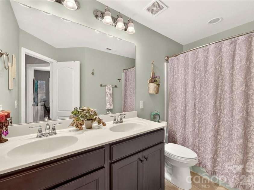 3093 Hartson Pointe Drive, Fort Mill, SC 29707.  MLS# CAR4402189, YatesRealty ID 37679. Full bathroom located on the second level.