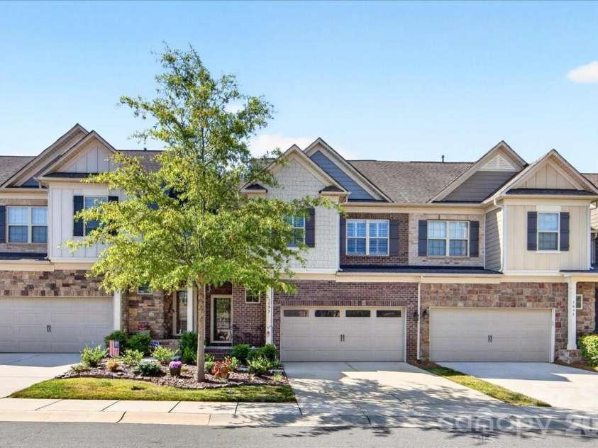 3093 Hartson Pointe Drive, Fort Mill, SC 29707.  MLS# CAR4402189, YatesRealty ID 37679. Full Brick Construction 4 Bedrooms 3.5 Bath 2 Story with Finished Basement Largest unit in complex 2922 SF
