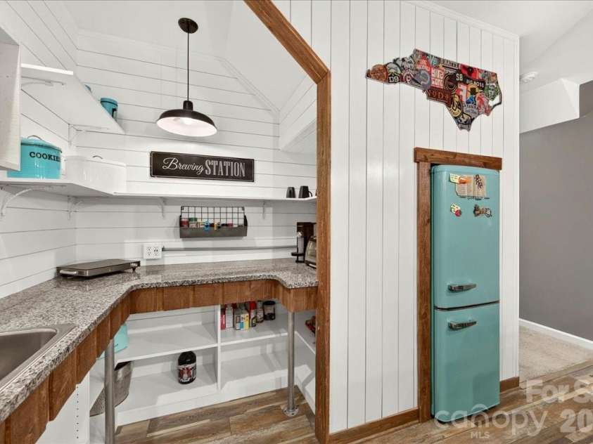 3093 Hartson Pointe Drive, Fort Mill, SC 29707.  MLS# CAR4402189, YatesRealty ID 37679. Kitchenette in basement with SMEG FRIG