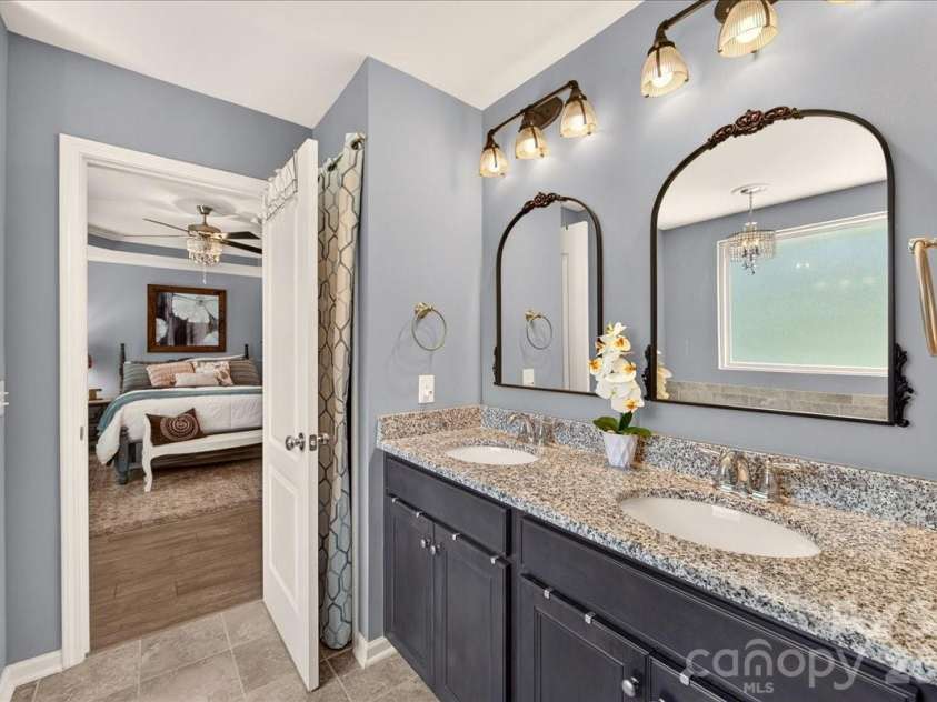 3093 Hartson Pointe Drive, Fort Mill, SC 29707.  MLS# CAR4402189, YatesRealty ID 37679. Luxury ensuite bathroom with double vanity