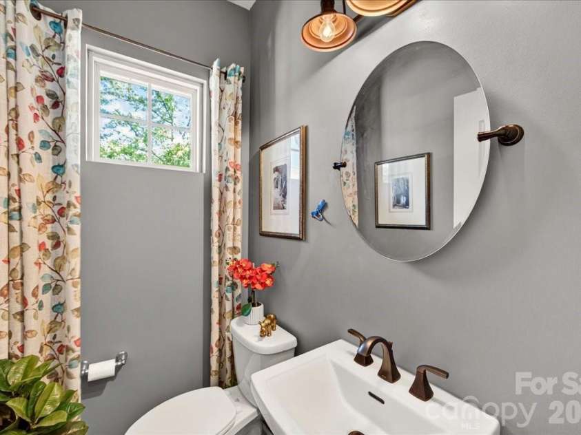 3093 Hartson Pointe Drive, Fort Mill, SC 29707.  MLS# CAR4402189, YatesRealty ID 37679. Main level half bath