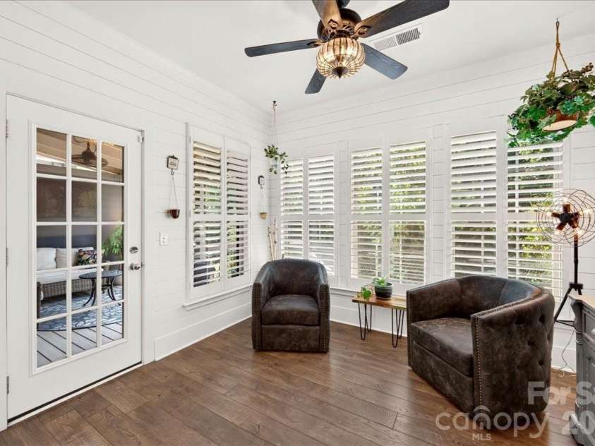 3093 Hartson Pointe Drive, Fort Mill, SC 29707.  MLS# CAR4402189, YatesRealty ID 37679. Sunroom with natural light opens to large covered deck