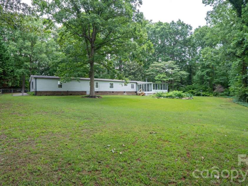 125 Red Fox Court, Mount Holly, NC 28120.  MLS# CAR4403020, YatesRealty ID 37684. View from fully fenced backyard