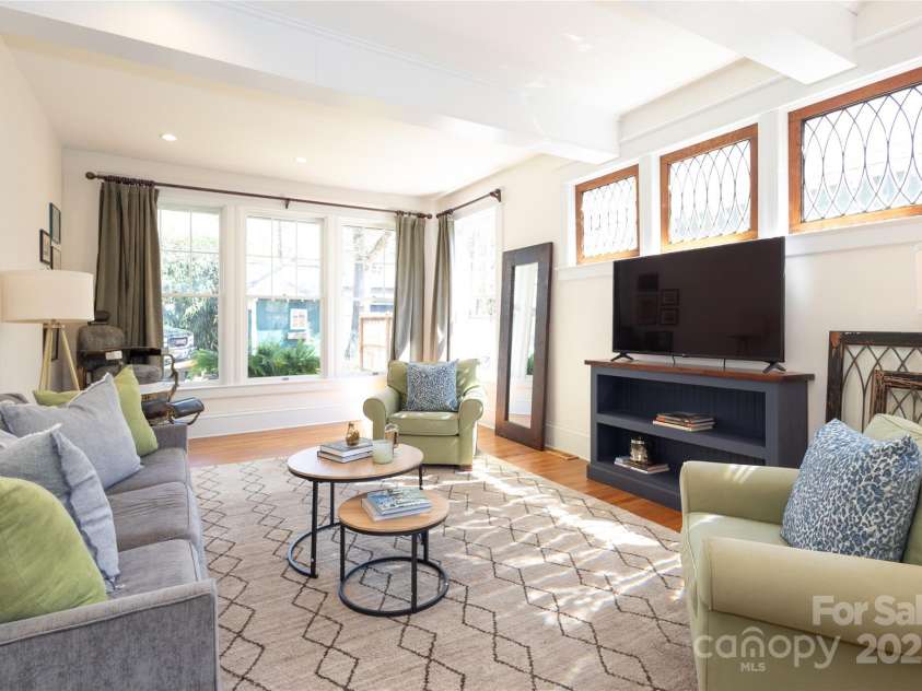 809 Worthington Avenue, Charlotte, NC 28203.  MLS# CAR4230687, YatesRealty ID 3769. Light filled family room with custom windows from the Edward Latta Dilworth home