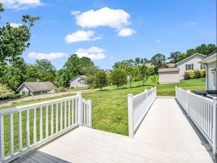 355 Hidden Meadow Drive, Hendersonville, NC 28792.  MLS# CAR4403011, YatesRealty ID 37699. Back deck perfect for grilling.