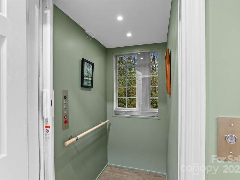 249 Pine Mountain Trail, Brevard, NC 28712.  MLS# CAR4321660, YatesRealty ID 377. Elevator to lower level