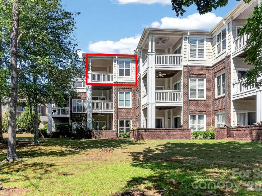 797 Peninsula Drive, Davidson, NC 28036.  MLS# CAR4403741, YatesRealty ID 37700. Back of condo