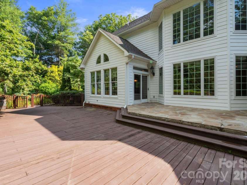 107 Windsong Drive Extension, Fairview, NC 28730.  MLS# CAR4395171, YatesRealty ID 37701. Back Deck