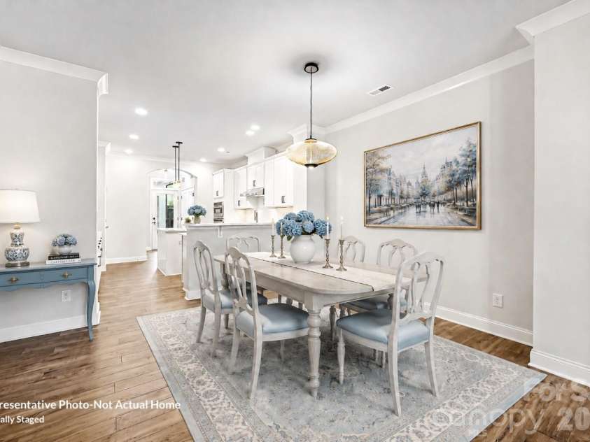 10231 Rainier Trail Drive, Huntersville, NC 28078.  MLS# CAR4399047, YatesRealty ID 37703. Dining-Virtually Staged-Bordeaux