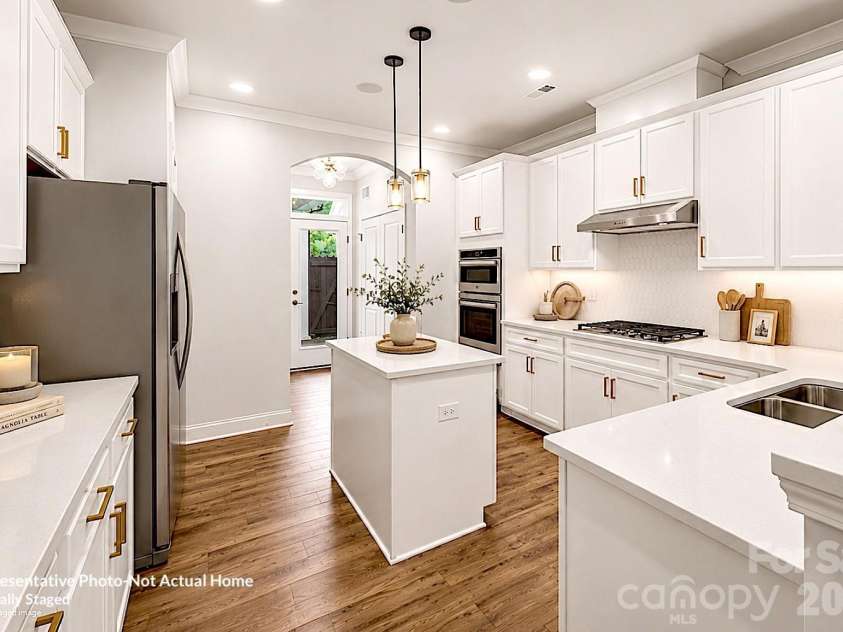 10231 Rainier Trail Drive, Huntersville, NC 28078.  MLS# CAR4399047, YatesRealty ID 37703. Kitchen-Virtually Staged-Bordeaux