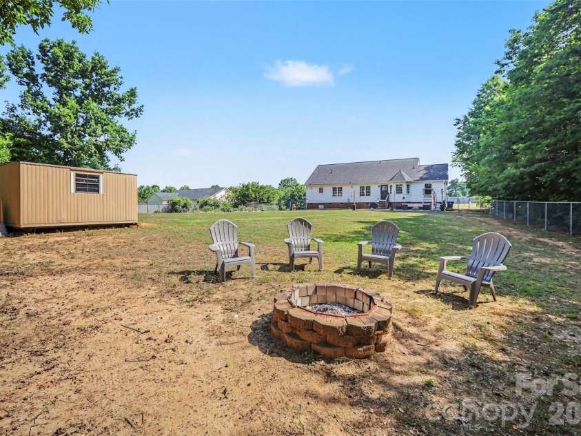137 Chambwood Lane, Shelby, NC 28152.  MLS# CAR4400960, YatesRealty ID 37705. Fire Pit Backyard