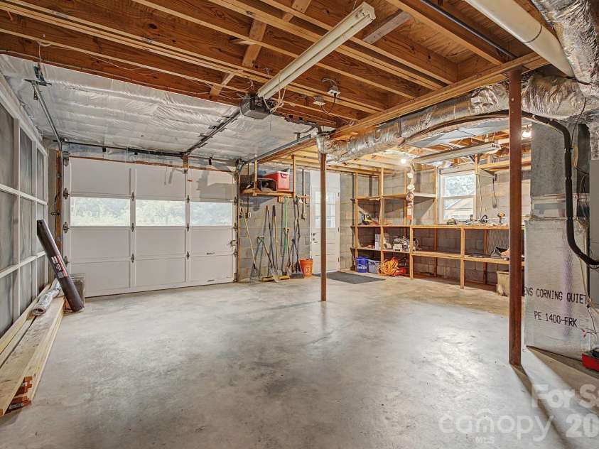 53 Merion Drive, Asheville, NC 28806.  MLS# CAR4391871, YatesRealty ID 37706. One-car garage with Ample Storage