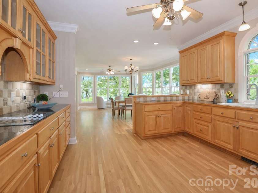 119 Shelter Cove Lane, Mooresville, NC 28117.  MLS# CAR4365805, YatesRealty ID 37707. Kitchen with captivating views of the lake