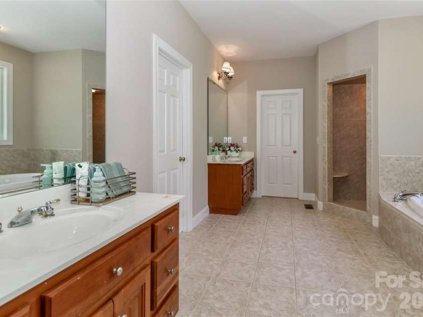 119 Shelter Cove Lane, Mooresville, NC 28117.  MLS# CAR4365805, YatesRealty ID 37707. Primary Bath with Separate Vanities
