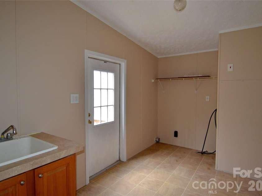 73 Walton Place Drive, Nebo, NC 28761.  MLS# CAR4340225, YatesRealty ID 3771. Laundry room