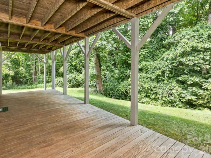 2 Birkdale Drive, Weaverville, NC 28787.  MLS# CAR4399312, YatesRealty ID 37716. Lower level covered deck