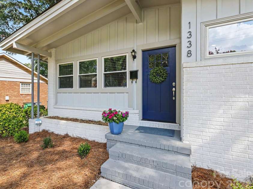 1338 Edgewater Drive, Charlotte, NC 28210.  MLS# CAR4401777, YatesRealty ID 37727. Front porch and planter