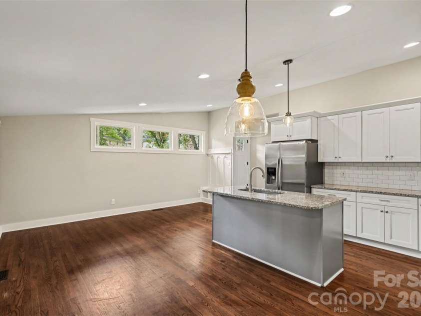 1338 Edgewater Drive, Charlotte, NC 28210.  MLS# CAR4401777, YatesRealty ID 37727. Kitchen overlooking living room