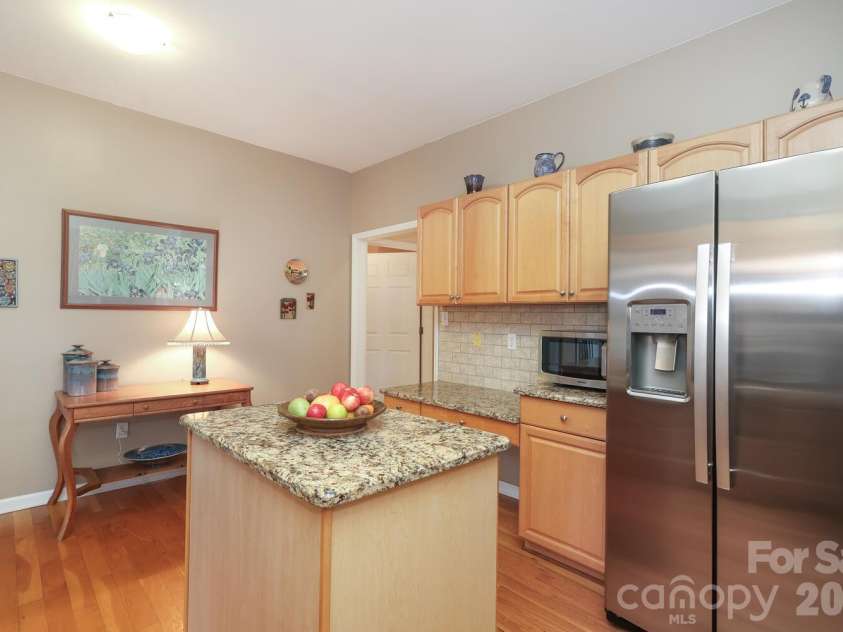 2601 Rustic Ridge Court, Charlotte, NC 28270.  MLS# CAR4346478, YatesRealty ID 37736. Kitchen includes a Pantry and a Desk