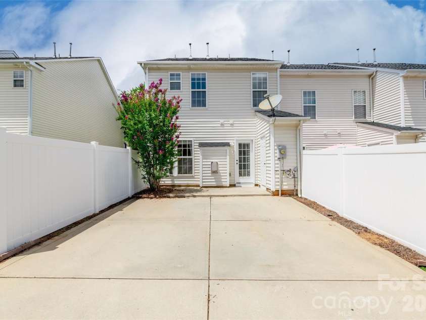 856 Dillard Road, Rock Hill, SC 29730.  MLS# CAR4404425, YatesRealty ID 37737. Spacious parking pad and patio!