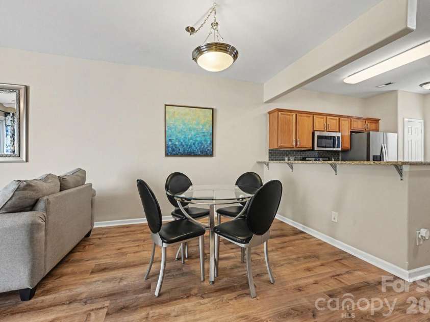 5338 Silabert Avenue, Charlotte, NC 28205.  MLS# CAR4399038, YatesRealty ID 37739. Dining area adjacent to kitchen.