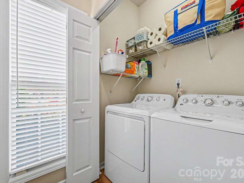 5338 Silabert Avenue, Charlotte, NC 28205.  MLS# CAR4399038, YatesRealty ID 37739. First-floor laundry closet convenient to kitchen.