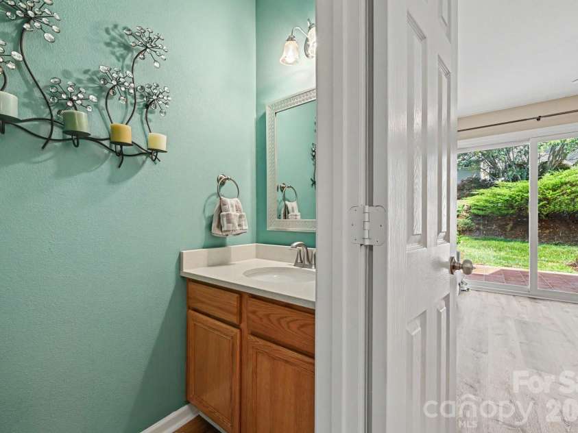 5338 Silabert Avenue, Charlotte, NC 28205.  MLS# CAR4399038, YatesRealty ID 37739. First-level half-bathroom convenient for guests!