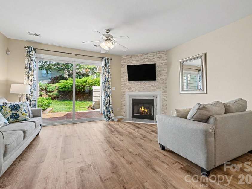 5338 Silabert Avenue, Charlotte, NC 28205.  MLS# CAR4399038, YatesRealty ID 37739. Open floor plan with fireplace!