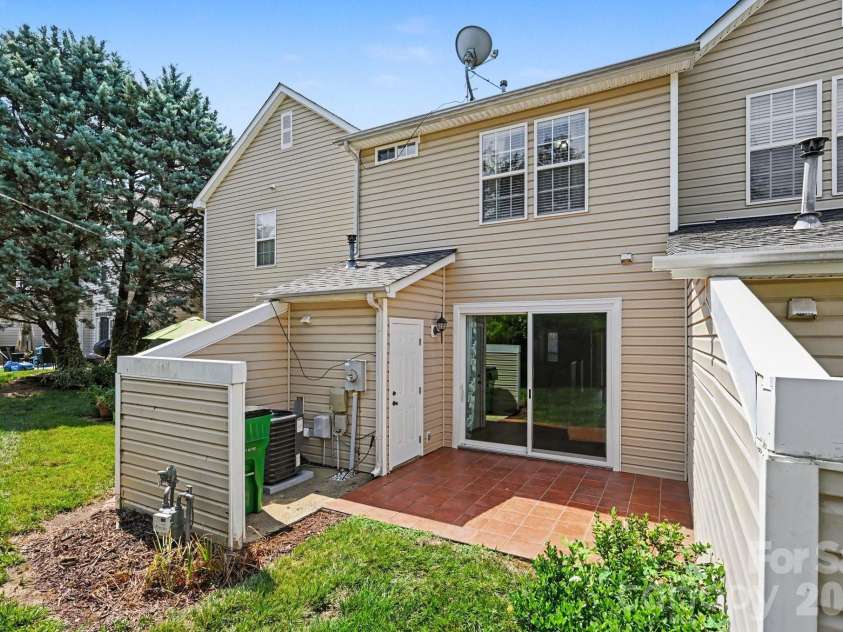 5338 Silabert Avenue, Charlotte, NC 28205.  MLS# CAR4399038, YatesRealty ID 37739. Rear view featuring patio area for entertaining.