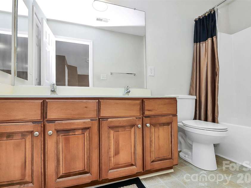 9411 Shumacher Avenue, Concord, NC 28027.  MLS# CAR4324917, YatesRealty ID 3774. Double sink in secondary bathroom