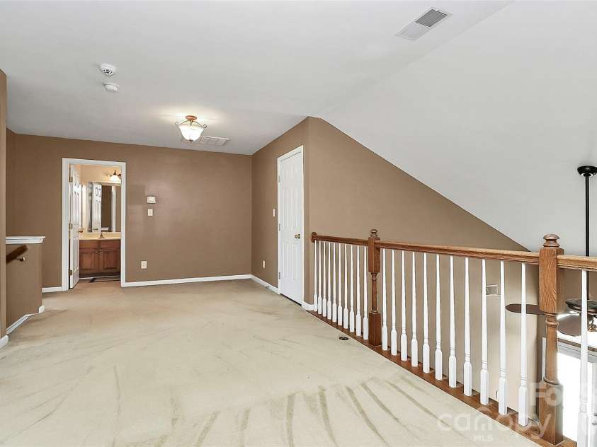 9411 Shumacher Avenue, Concord, NC 28027.  MLS# CAR4324917, YatesRealty ID 3774. Loft area - 2 bedrooms - full bathroom - upstairs
