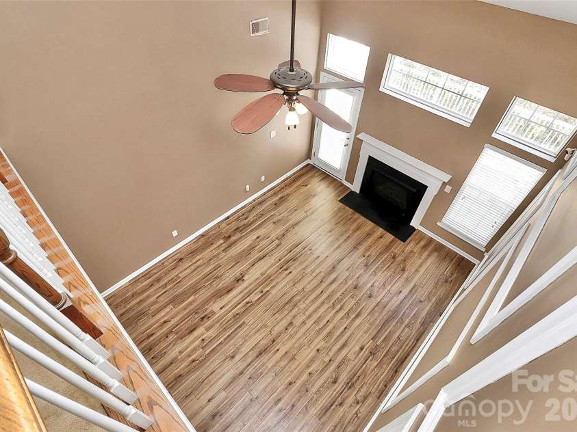 9411 Shumacher Avenue, Concord, NC 28027.  MLS# CAR4324917, YatesRealty ID 3774. Loft looking over great room