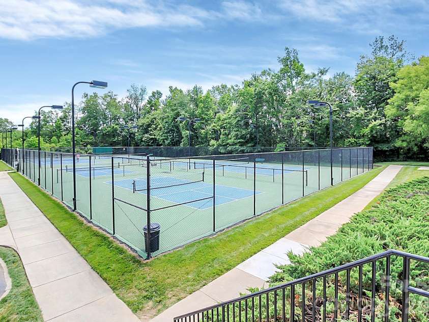 9411 Shumacher Avenue, Concord, NC 28027.  MLS# CAR4324917, YatesRealty ID 3774. Tennis courts