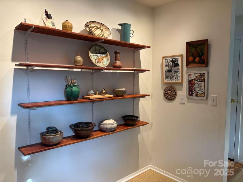 1235 Pinebrook Circle, Hendersonville, NC 28739.  MLS# CAR4309617, YatesRealty ID 3775. Kitchen Shelves