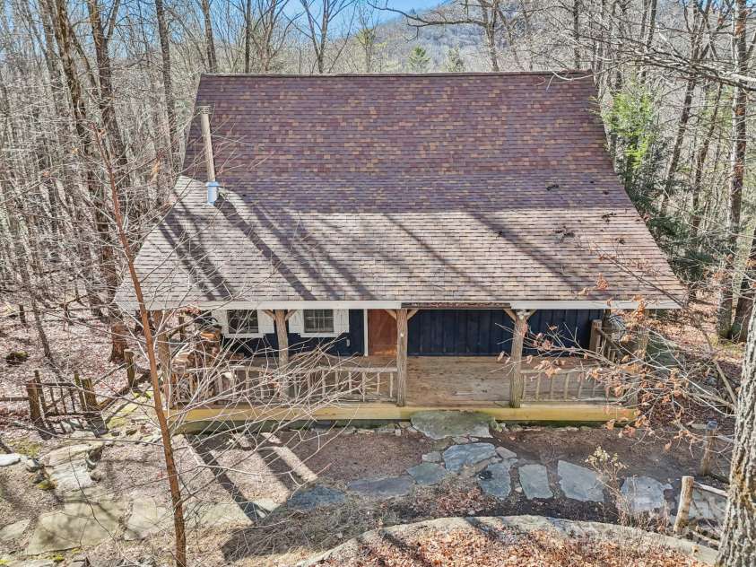 102 Knobster Way, Glenville, NC 28736.  MLS# CAR4325693, YatesRealty ID 3776. 102 Knobster Way - the little cabin set in the woods.