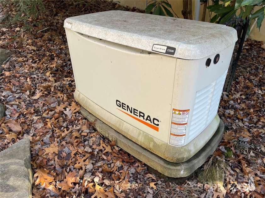 102 Knobster Way, Glenville, NC 28736.  MLS# CAR4325693, YatesRealty ID 3776. A 22kW generator to protect against power outage,