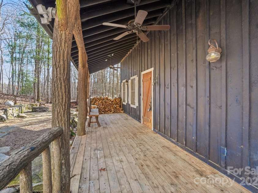102 Knobster Way, Glenville, NC 28736.  MLS# CAR4325693, YatesRealty ID 3776. A long front porch awaits your rocking chairs, 
