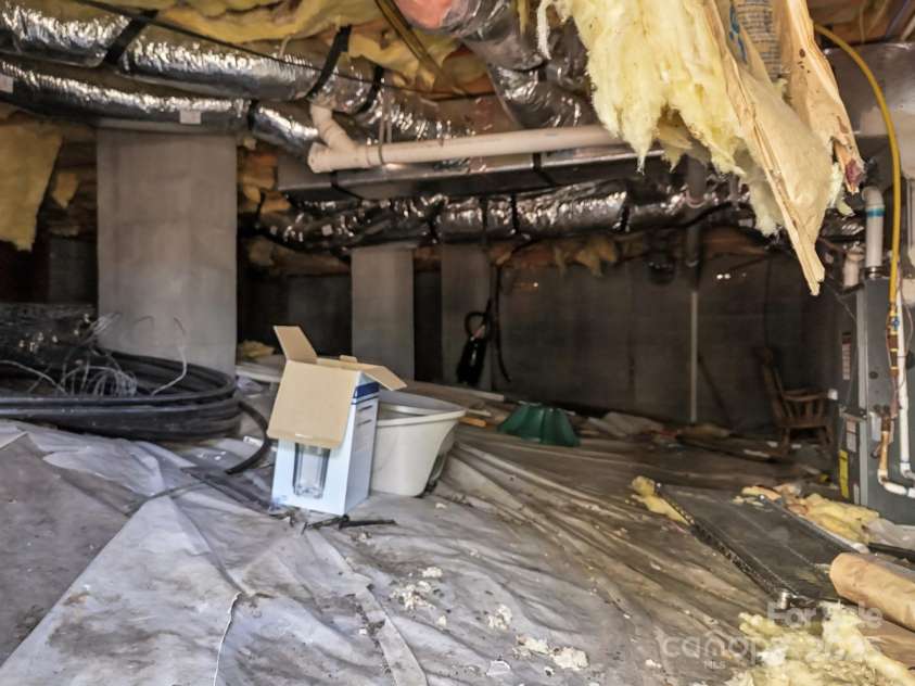 102 Knobster Way, Glenville, NC 28736.  MLS# CAR4325693, YatesRealty ID 3776. And roomy crawl space providing easy furnace access and extra storage space.