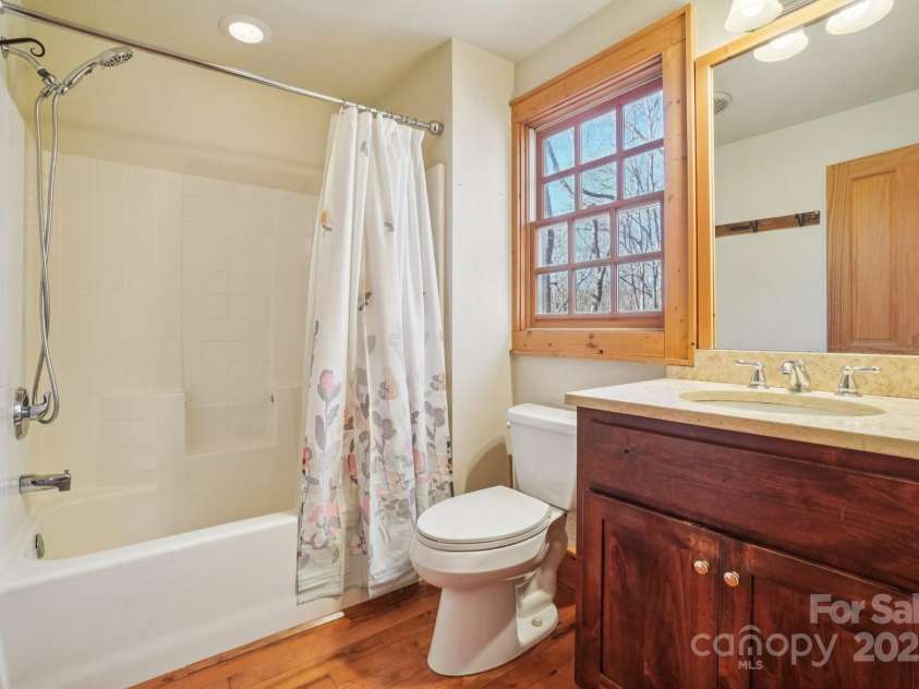 102 Knobster Way, Glenville, NC 28736.  MLS# CAR4325693, YatesRealty ID 3776. Features its own full bathroom.