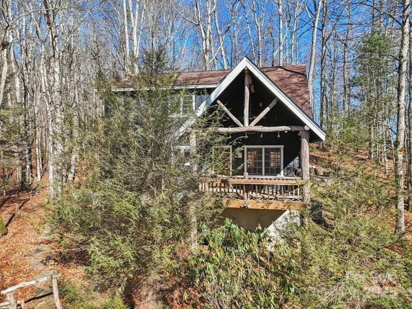 102 Knobster Way, Glenville, NC 28736.  MLS# CAR4325693, YatesRealty ID 3776. For the creative, there is usable space underneath the deck.
