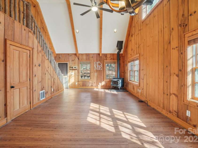 102 Knobster Way, Glenville, NC 28736.  MLS# CAR4325693, YatesRealty ID 3776. From the back of the room, note the coat closet to the left.