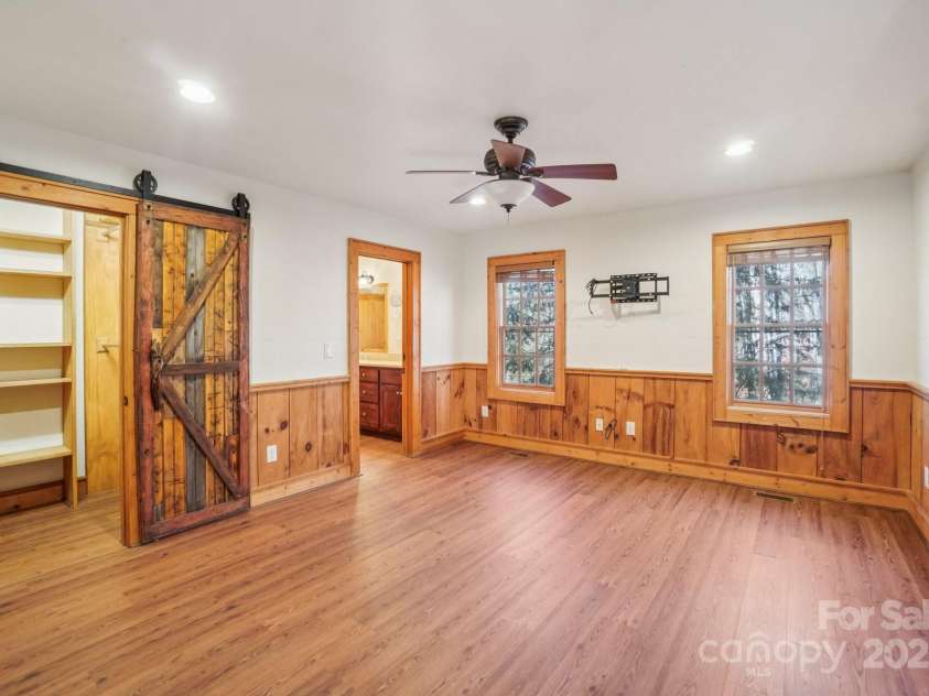 102 Knobster Way, Glenville, NC 28736.  MLS# CAR4325693, YatesRealty ID 3776. This room exits back near the front door.